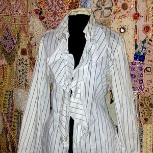 60% Cotton 38% Polyester 2% Spandex Ruffled front 6 button closure